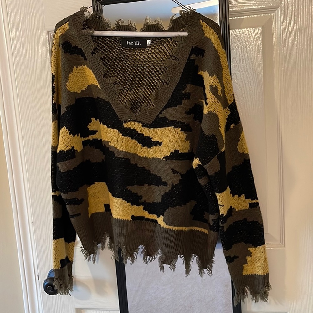 Fun, oversized camo sweater from local boutique